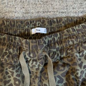 TNA cheetah print joggers
